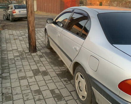 Серый Тойота Авенсис, объемом двигателя 1.6 л и пробегом 412 тыс. км за 2700 $, фото 3 на Automoto.ua