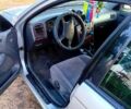 Серый Тойота Авенсис, объемом двигателя 1.8 л и пробегом 425 тыс. км за 3500 $, фото 1 на Automoto.ua