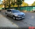 Серый Тойота Авенсис, объемом двигателя 2 л и пробегом 330 тыс. км за 4000 $, фото 1 на Automoto.ua