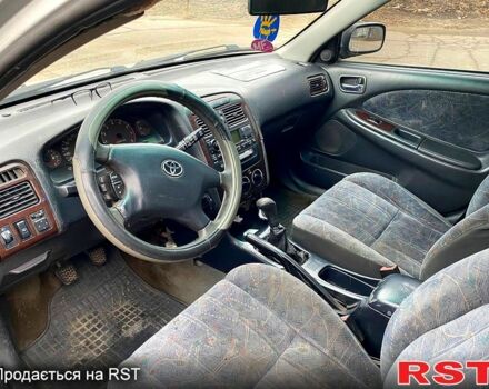 Серый Тойота Авенсис, объемом двигателя 2 л и пробегом 210 тыс. км за 4000 $, фото 10 на Automoto.ua