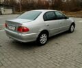 Серый Тойота Авенсис, объемом двигателя 2 л и пробегом 210 тыс. км за 4000 $, фото 1 на Automoto.ua