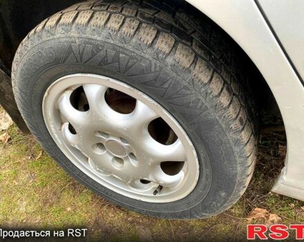 Серый Тойота Авенсис, объемом двигателя 2 л и пробегом 210 тыс. км за 4000 $, фото 11 на Automoto.ua