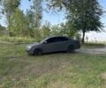 Серый Тойота Авенсис, объемом двигателя 1.8 л и пробегом 305 тыс. км за 5000 $, фото 2 на Automoto.ua