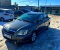 Серый Тойота Авенсис, объемом двигателя 2 л и пробегом 250 тыс. км за 4999 $, фото 1 на Automoto.ua