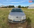 Серый Тойота Авенсис, объемом двигателя 1.6 л и пробегом 245 тыс. км за 4000 $, фото 1 на Automoto.ua