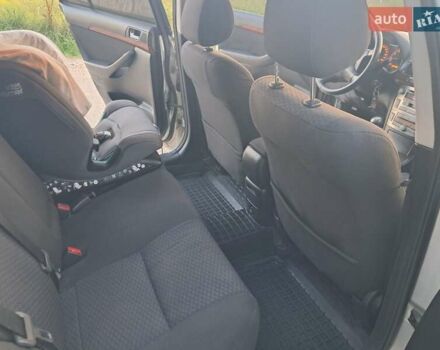 Серый Тойота Авенсис, объемом двигателя 1.79 л и пробегом 216 тыс. км за 6600 $, фото 3 на Automoto.ua
