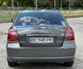 Серый Тойота Авенсис, объемом двигателя 2 л и пробегом 210 тыс. км за 6600 $, фото 5 на Automoto.ua