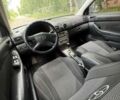 Серый Тойота Авенсис, объемом двигателя 1.8 л и пробегом 319 тыс. км за 4900 $, фото 6 на Automoto.ua