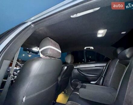 Серый Тойота Авенсис, объемом двигателя 1.6 л и пробегом 300 тыс. км за 5250 $, фото 25 на Automoto.ua