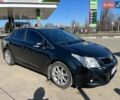 Серый Тойота Авенсис, объемом двигателя 2 л и пробегом 257 тыс. км за 10400 $, фото 1 на Automoto.ua