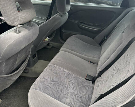 Серый Тойота Авенсис, объемом двигателя 1.8 л и пробегом 366 тыс. км за 2000 $, фото 3 на Automoto.ua