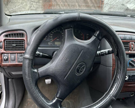 Серый Тойота Авенсис, объемом двигателя 1.8 л и пробегом 366 тыс. км за 2000 $, фото 5 на Automoto.ua