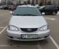 Серый Тойота Авенсис, объемом двигателя 1.8 л и пробегом 427 тыс. км за 3900 $, фото 1 на Automoto.ua