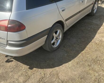 Серый Тойота Авенсис, объемом двигателя 2 л и пробегом 436 тыс. км за 3500 $, фото 2 на Automoto.ua