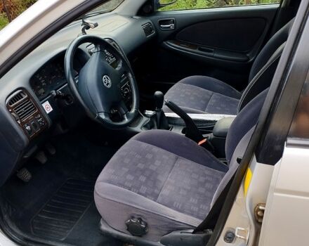 Серый Тойота Авенсис, объемом двигателя 2 л и пробегом 215 тыс. км за 3500 $, фото 3 на Automoto.ua