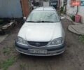 Серый Тойота Авенсис, объемом двигателя 1.8 л и пробегом 256 тыс. км за 3900 $, фото 1 на Automoto.ua
