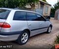 Серый Тойота Авенсис, объемом двигателя 2 л и пробегом 214 тыс. км за 4000 $, фото 1 на Automoto.ua