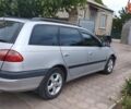 Серый Тойота Авенсис, объемом двигателя 2 л и пробегом 214 тыс. км за 3500 $, фото 1 на Automoto.ua
