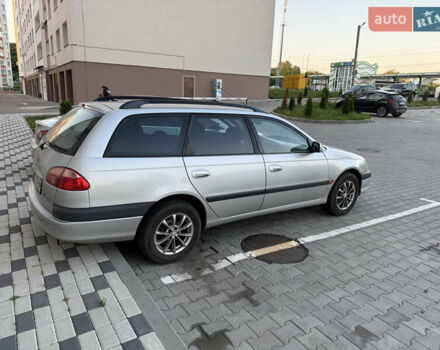 Серый Тойота Авенсис, объемом двигателя 1.8 л и пробегом 233 тыс. км за 4800 $, фото 2 на Automoto.ua