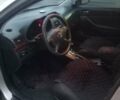 Серый Тойота Авенсис, объемом двигателя 2.36 л и пробегом 216 тыс. км за 5500 $, фото 18 на Automoto.ua