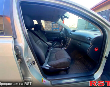 Серый Тойота Авенсис, объемом двигателя 2 л и пробегом 406 тыс. км за 4700 $, фото 5 на Automoto.ua