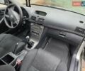 Серый Тойота Авенсис, объемом двигателя 2 л и пробегом 312 тыс. км за 4400 $, фото 18 на Automoto.ua