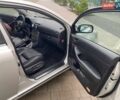 Сірий Тойота Авенсіс, об'ємом двигуна 2.36 л та пробігом 237 тис. км за 6100 $, фото 6 на Automoto.ua
