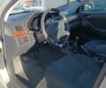 Серый Тойота Авенсис, объемом двигателя 2 л и пробегом 294 тыс. км за 5000 $, фото 4 на Automoto.ua