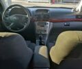 Серый Тойота Авенсис, объемом двигателя 2 л и пробегом 239 тыс. км за 6500 $, фото 6 на Automoto.ua