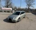 Серый Тойота Авенсис, объемом двигателя 2 л и пробегом 310 тыс. км за 2600 $, фото 1 на Automoto.ua