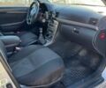 Серый Тойота Авенсис, объемом двигателя 2.2 л и пробегом 241 тыс. км за 5500 $, фото 1 на Automoto.ua