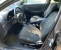 Серый Тойота Авенсис, объемом двигателя 2 л и пробегом 382 тыс. км за 6700 $, фото 4 на Automoto.ua
