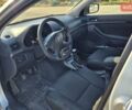 Серый Тойота Авенсис, объемом двигателя 2 л и пробегом 259 тыс. км за 7500 $, фото 5 на Automoto.ua