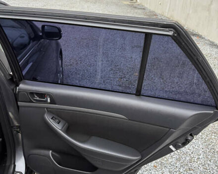 Серый Тойота Авенсис, объемом двигателя 2 л и пробегом 194 тыс. км за 7800 $, фото 79 на Automoto.ua