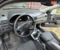 Серый Тойота Авенсис, объемом двигателя 2.23 л и пробегом 242 тыс. км за 7500 $, фото 4 на Automoto.ua