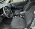 Серый Тойота Авенсис, объемом двигателя 2 л и пробегом 249 тыс. км за 7200 $, фото 6 на Automoto.ua