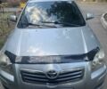 Серый Тойота Авенсис, объемом двигателя 2 л и пробегом 235 тыс. км за 6395 $, фото 2 на Automoto.ua