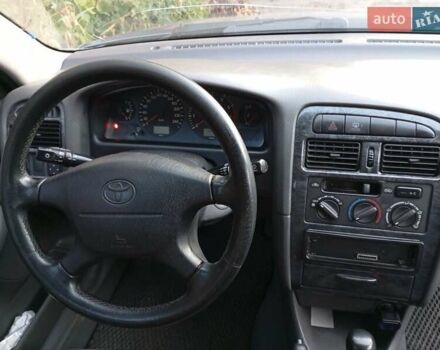 Серый Тойота Авенсис, объемом двигателя 1.6 л и пробегом 210 тыс. км за 2800 $, фото 4 на Automoto.ua