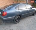 Серый Тойота Авенсис, объемом двигателя 1.6 л и пробегом 210 тыс. км за 2800 $, фото 1 на Automoto.ua