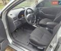 Сірий Тойота Авенсіс, об'ємом двигуна 2 л та пробігом 257 тис. км за 6500 $, фото 11 на Automoto.ua