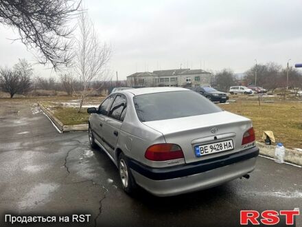 Серый Тойота Авенсис, объемом двигателя 1.6 л и пробегом 340 тыс. км за 2500 $, фото 1 на Automoto.ua