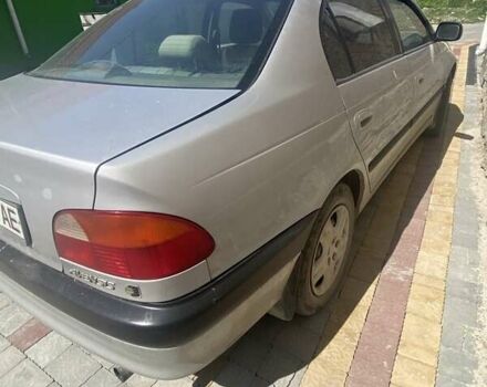 Серый Тойота Авенсис, объемом двигателя 1.76 л и пробегом 298 тыс. км за 2350 $, фото 1 на Automoto.ua