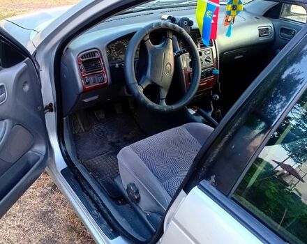 Серый Тойота Авенсис, объемом двигателя 1.8 л и пробегом 425 тыс. км за 3500 $, фото 1 на Automoto.ua