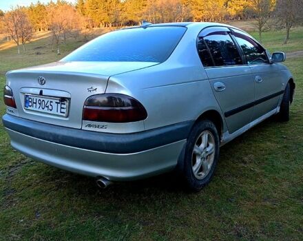 Серый Тойота Авенсис, объемом двигателя 1.8 л и пробегом 326 тыс. км за 3500 $, фото 1 на Automoto.ua