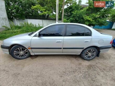 Серый Тойота Авенсис, объемом двигателя 2 л и пробегом 180 тыс. км за 3800 $, фото 1 на Automoto.ua