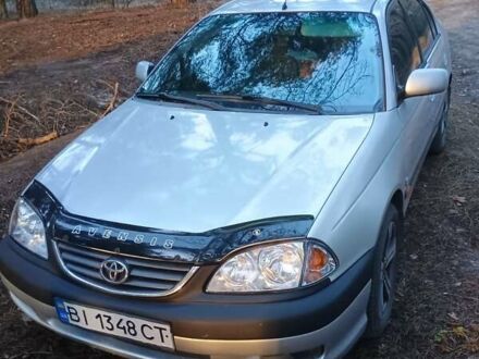 Серый Тойота Авенсис, объемом двигателя 2 л и пробегом 190 тыс. км за 4200 $, фото 1 на Automoto.ua