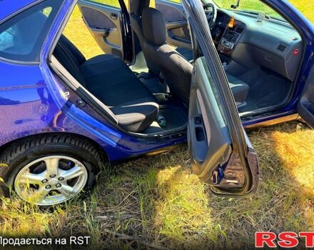 Синий Тойота Авенсис, объемом двигателя 1.8 л и пробегом 329 тыс. км за 3900 $, фото 4 на Automoto.ua