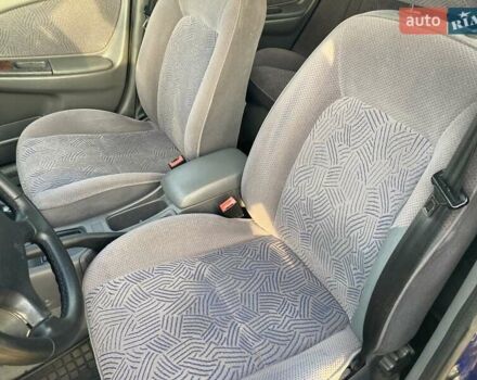 Синій Тойота Авенсіс, об'ємом двигуна 1.8 л та пробігом 391 тис. км за 3500 $, фото 7 на Automoto.ua