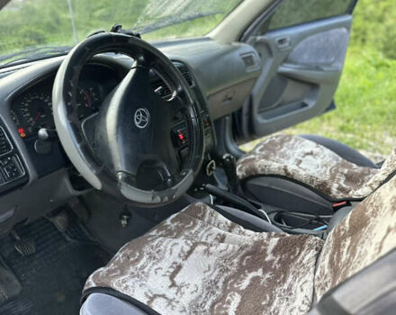 Синій Тойота Авенсіс, об'ємом двигуна 1.59 л та пробігом 1 тис. км за 3000 $, фото 4 на Automoto.ua
