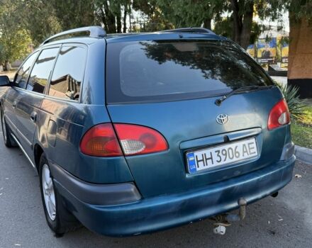 Синий Тойота Авенсис, объемом двигателя 1.8 л и пробегом 250 тыс. км за 2300 $, фото 2 на Automoto.ua